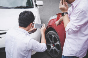 Do I File a Claim With My Own Insurance or the Other Driver's?
